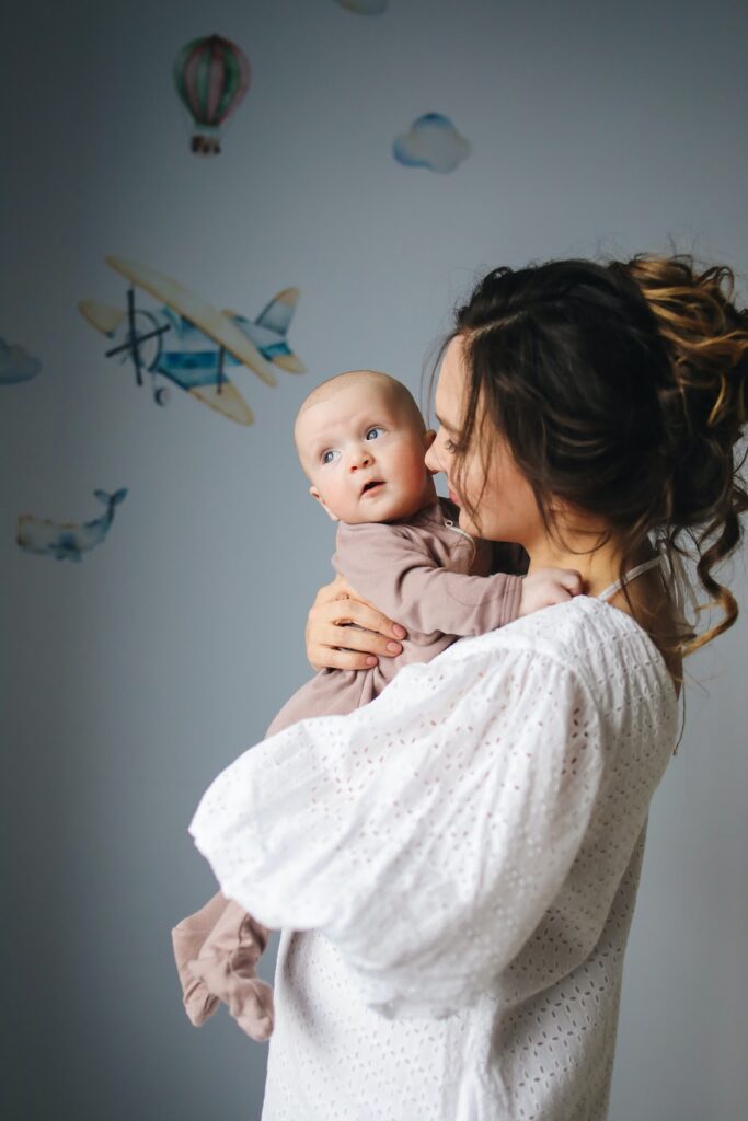 mother with baby in the room